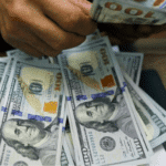 Hundred dollar cash bills. File photo