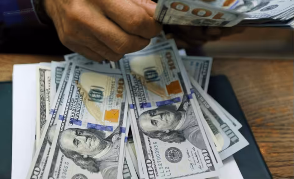 Hundred dollar cash bills. File photo