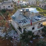 Destroyed building in Idlib, in which alleged ISIS head Abu Ibrahim al-Hashimi al-Qurayshi was killed by US bombers, or he self-detonated, although what seems to have happened is the illegal US forces massacred 14 civilians, mostly women and children. Photo: Sky News