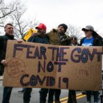 In the midst of the pandemic, trust in business and government have fallen among the US population. Photo: Nurphoto via Getty Images