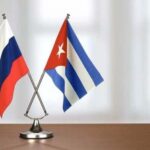Cuban and Russian table size flags. File photo.