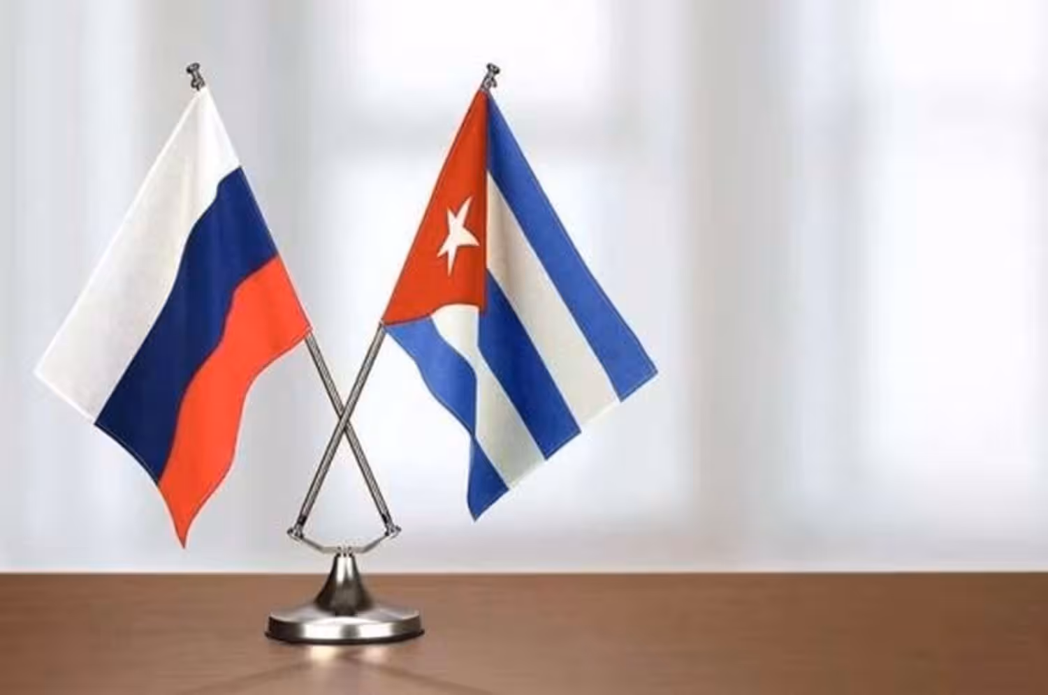 Cuban and Russian table size flags. File photo.