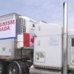 Featured image: There were many anti-communist slogans and banners deployed during Canada's "Freedom Convoy" demonstrations. Photo: TBS News Watch.