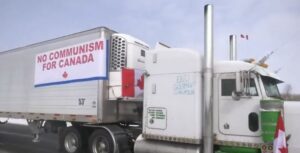 Featured image: There were many anti-communist slogans and banners deployed during Canada's "Freedom Convoy" demonstrations. Photo: TBS News Watch.
