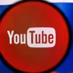 Featured image: Youtube logo on top of Russian flag. Photo: RT