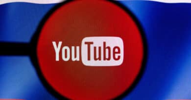 Featured image: Youtube logo on top of Russian flag. Photo: RT