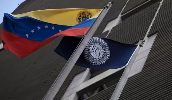 Central Bank of Venezuela (BCV) headquarters in Caracas with BCV flag and the Venezuelan flag. File photo.