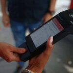 BioPago payment terminal being used to pay and register consume of subsidized gasoline in Venezuela. File photo.