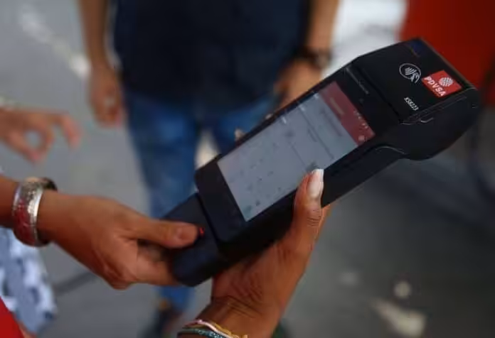 BioPago payment terminal being used to pay and register consume of subsidized gasoline in Venezuela. File photo.