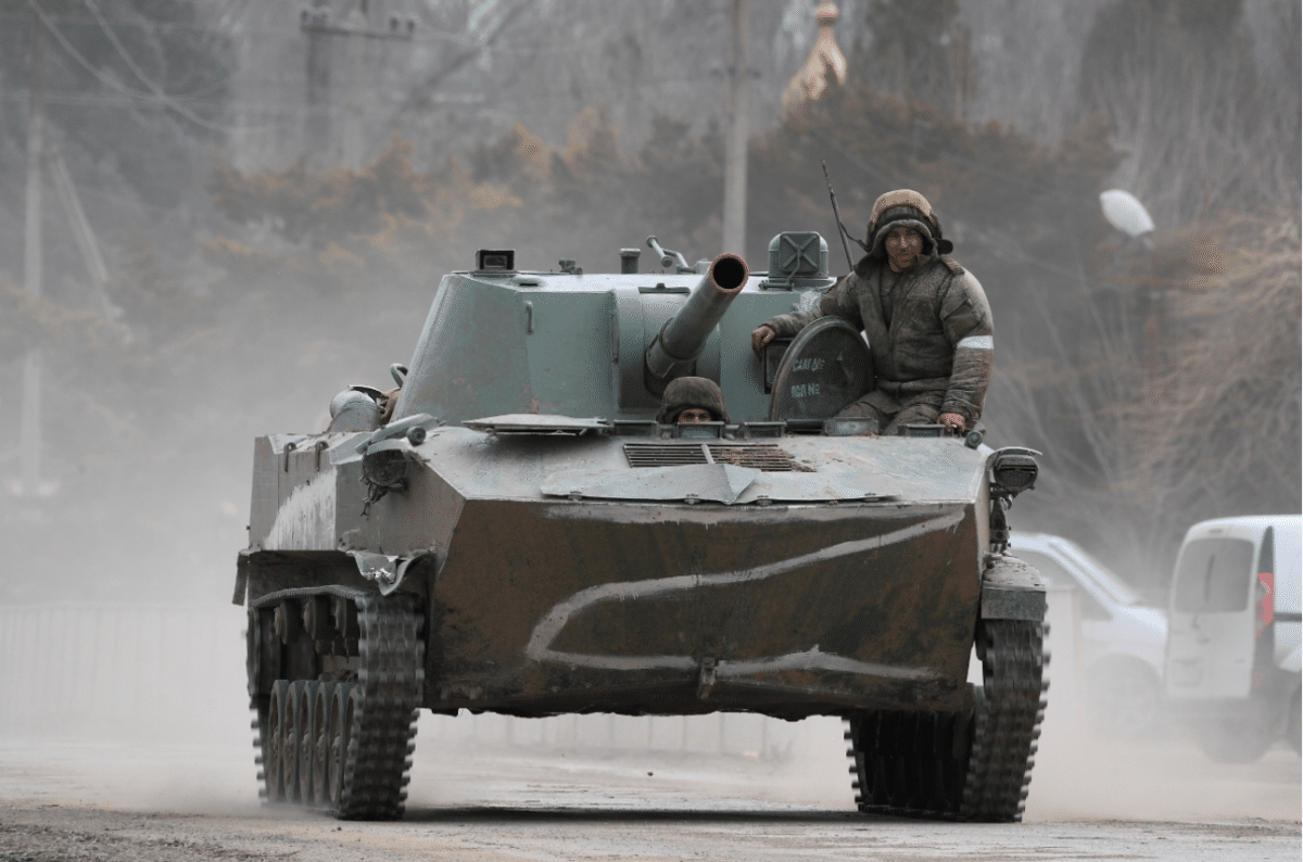 A military vehicle drives along a road in Armyansk in the northern part of Crimea on February 24, 2022. Photo: Sputnik