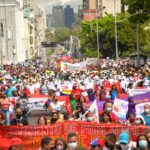 Venezuelans marching in Caracas to commemorate International Women's Day on March 8, 2022.  Photo: Twitter / @NicolasMaduro.