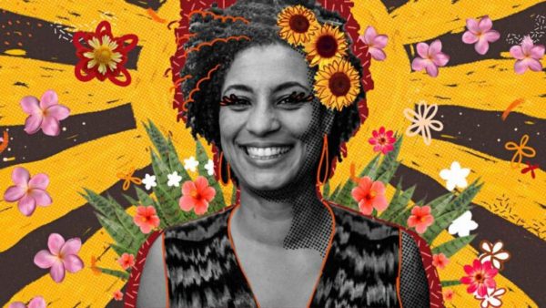 Poster showing murdered Brazilian politician and activist Marielle Franco's face in a background of flowers. Photo: Elstica magazine