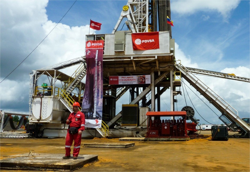 PDVSA oil worker near an oil rig in Venezuela. File photo.