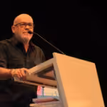 Featured image: Jorge Rodríguez speaks at a podium. Photo: Wilmer Errades. 