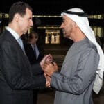 Syria's President Bashar al-Assad (left) being greeted by Abu Dhabi Crown Prince Mohammed bin Zayed Al Nahyan (right), in Abu Dhabi, March 18, 2022. Photo: Syrian Presidency handout