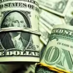 US dollar bills, the principal currency of exchange in international trade and transactions. File photo.