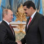 Venezuelan President Nicolas Maduro (right) being greeted by Russian President Vladimir Putin (left) in Moscow. File photo.