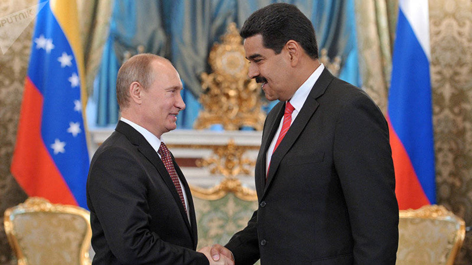 Venezuelan President Nicolas Maduro (right) being greeted by Russian President Vladimir Putin (left) in Moscow. File photo.