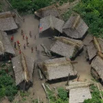 Featured image: Aerial view of a  Yanomami community in the Venezuelans Amazonas. Photo: AP / Ariana Cubillos.
