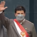Peruvian President Pedro Castillo waves as he leaves the Congress building in Lima on March 28, 2022. Photo: AFP.