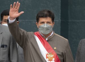 Peruvian President Pedro Castillo waves as he leaves the Congress building in Lima on March 28, 2022. Photo: AFP.