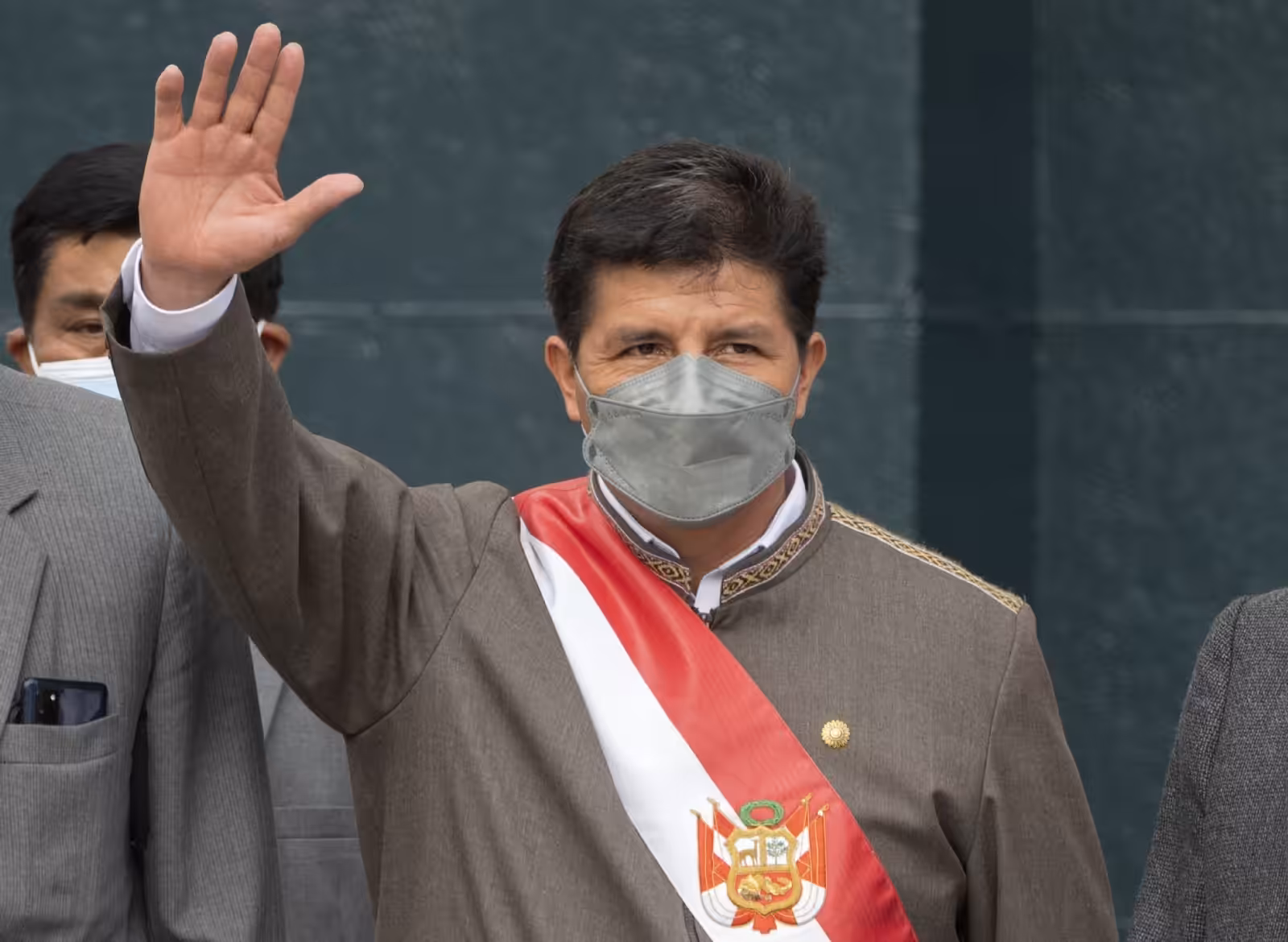 Peruvian President Pedro Castillo waves as he leaves the Congress building in Lima on March 28, 2022. Photo: AFP.