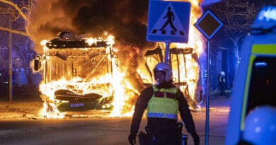 A policeman during riots in the city of Malmo, Sweden, on April 16, 2022. Photo: Johan Nilsson/TT News Agency/AFP.