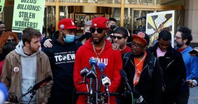 Featured image: Chris Smalls, one of the leaders who organized the union at an Amazon Staten Island distribution center, speaks to the press while other workers cheer after the union votes were tallied, on April 1 in New York City. Photo: Jason Szenes/EPA/Shutterstock