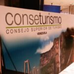 Conseturismo poster portraying the bridge Orinokia and the Angel Falls in the south of Venezuela. File photo.
