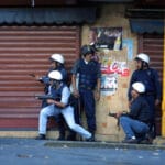 Policemen from the Metropolitan Police (involved in the Coup) shooting at the pro-Chavista demonstrators concentrated at the Puente Llaguno bridge, Caracas. File photo.