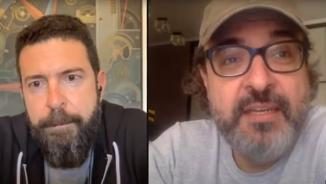 Featured image: Chilean journalist and author Gonzalo Lira (right) speaks to Alex Cristoforou (left) of The Duran, reporting on his current situation. Photo: Screenshot from The Duran video.