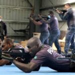 China police liaison team officers train local Solomon Islands police officers in drill. Photograph: RSIPF/AFP/Getty Images