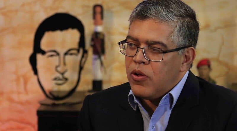 Former Venezuelan Vice President and PSUV leader, Elias Jaua with art objects of Hugo Chavez and Simon Bolivar in the background. Photo: Venezuelanalysis.com.