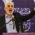 Featured image: Hamas movement leader in Gaza, Yahya Sinwar, speaks during a meeting in Gaza City on 30 April 2022.  Photo credit: Mahmud HAMS / AFP.