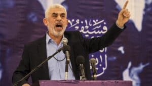 Featured image: Hamas movement leader in Gaza, Yahya Sinwar, speaks during a meeting in Gaza City on 30 April 2022.  Photo credit: Mahmud HAMS / AFP.
