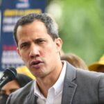 Featured image: Self-proclaimed "interim president" of Venezuela, Juan Guaidó, speaking at a press conference in Caracas, Venezuela, on March 17, 2022. File photo.