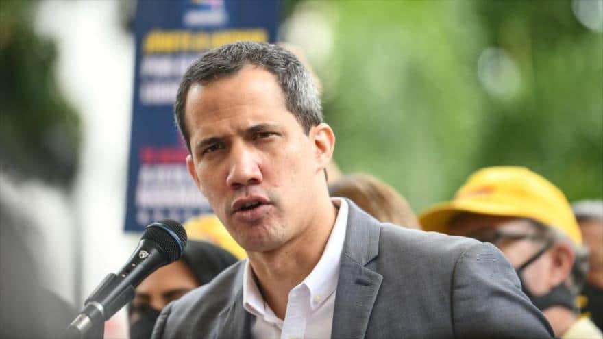Featured image: Self-proclaimed "interim president" of Venezuela, Juan Guaidó, speaking at a press conference in Caracas, Venezuela, on March 17, 2022. File photo.