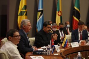 Featured image: Seated consecutively Cuba's Minister of Foreign Affairs Bruno Rodriguez, Cuba’s President Miguel Diaz-Canal, and Venezuela’s President Nicolas Maduro. Photo: Venezuelanalysis.com.