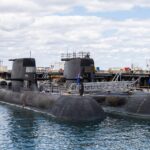 Diesel-powered submarines are seen docked at a naval base in Perth. The Aukus alliance allows for the sharing of nuclear-submarine technology. Photo: EPA-EFE.