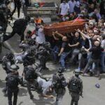 Featured image: Israeli police attack the funeral procession of slain Palestinian journalist Shireen Abu Akleh. Photo: EFE.