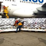 Russian flu vaccines being unloaded from a cargo plane at the Simón Bolívar International Airport serving Caracas, Venezuela. Photo: Twitter/@EmbSergio.