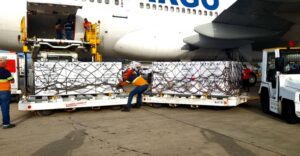 Russian flu vaccines being unloaded from a cargo plane at the Simón Bolívar International Airport serving Caracas, Venezuela. Photo: Twitter/@EmbSergio.