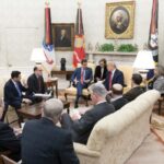 Juan Víctor Salcedo Márquez, cousin of Juan Guaidó, sits on the right hand side of Carlos Vecchio, Guaidó's "ambassador" to the US, during a meeting in the Oval Office of the White House. Photo: White House.