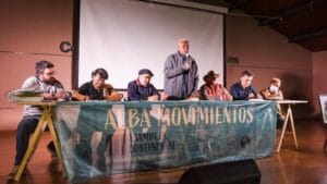 Featured image: Camille Chalmers of the Assembly of Caribbean Peoples speaks on a panel during the III Assembly of ALBA Movements. Photo: ALBA Movements.