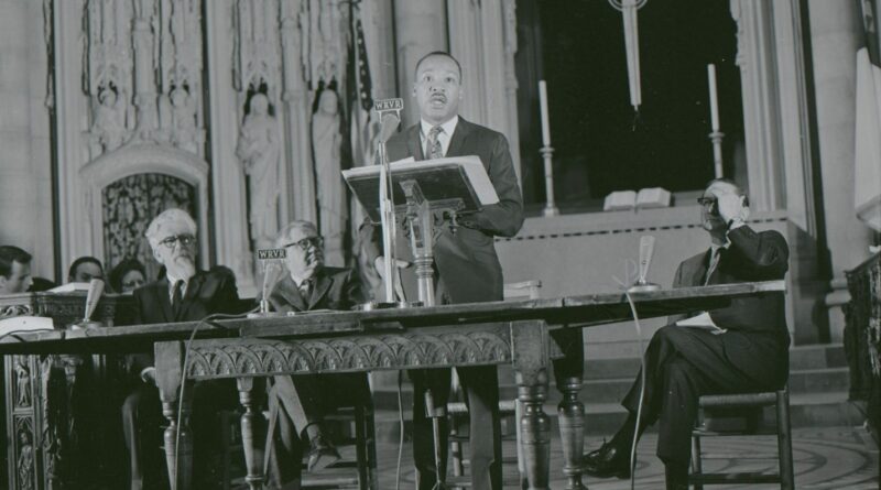 Featured image: King delivering his speech “Beyond Vietnam” at New York City’s Riverside Church in 1967. Photo John C. Goodwin.