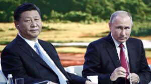 Russian President Vladimir Putin right) and his Chinese counterpart, Xi Jinping. Reuters photo.