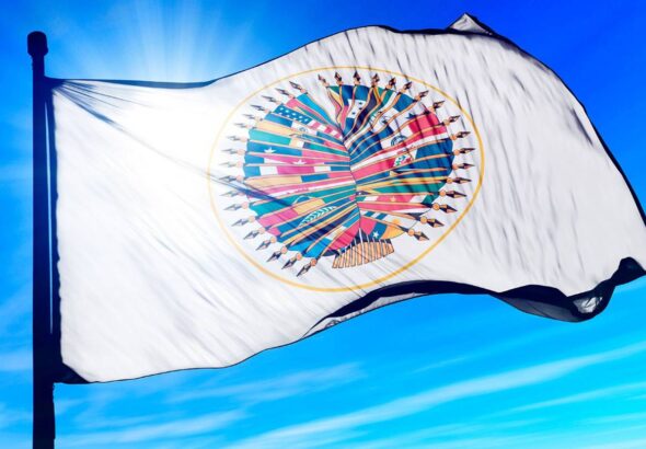 OAS flag, consisting of all flags of countries in the hemisphere. File photo