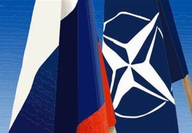 Featured image: Russia's flag and the flag of the North Atlantic Treaty Organization (NATO).