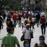 Busy street in Caracas, Venezuela with most people wearing face masks. File photo.