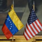 Table stand flags of Venezuela and the US. File photo.
